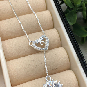 Gravatinha de prata 925 coração laço com ponto de luz cravejado - Imagem 11