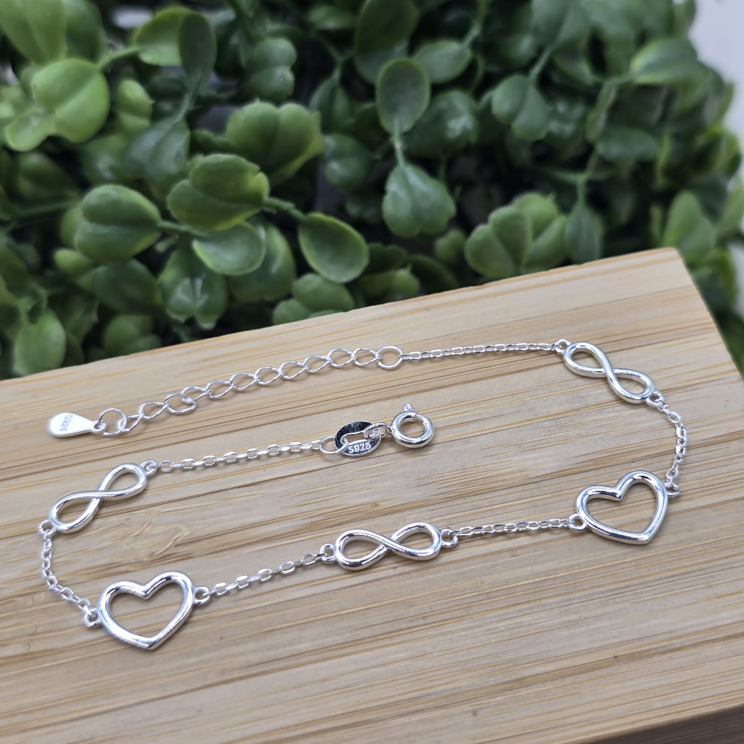 Pulseira de prata 925 com pingente coração e infinito vazado com extensor