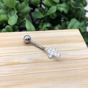 Piercing de Umbigo Furo Cruz Cravejada